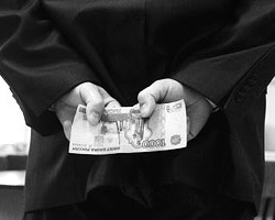 Нужно знать, что в то же самое время началось строжайшее преследование всяких взяток (фото: ИТАР-ТАСС)