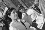 Активисты движения «Наши» заполняют анкеты, на заднем плане – Василий Якеменко
