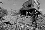 Ракетной атаке подвергся военный объект в Хомсе, по предварительным данным, ранения получили три человека&#160;(фото: Omar Sanadiki/Reuters)