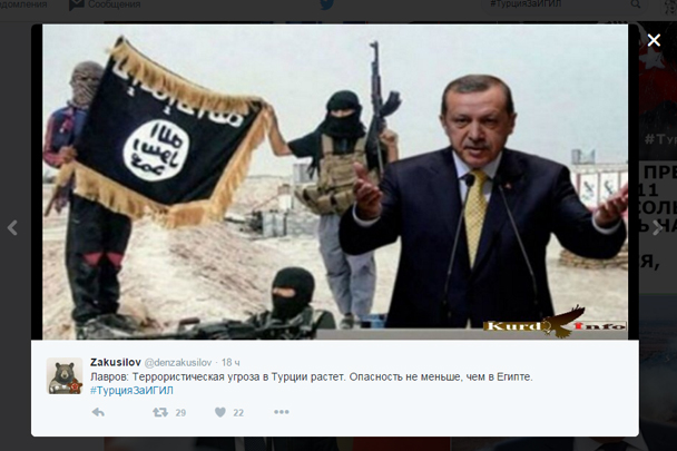 Реджепа Эрдогана изображают на фоне боевиков ИГ, отмечая, что президент Турции оказывает поддержку террористам