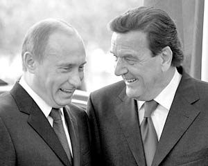 Президент России Владимир Путин и бывший канцлер Германии Герхард Шредер