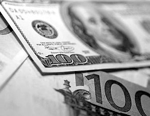 Средневзвешенный курс доллара США  повысился на 12,59 копейки