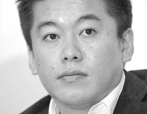 Глава интернет-компании Livedoor 33-летний Такафуми Хориэ