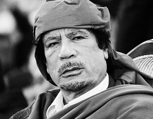 Каддафи тайно похоронили в пустыне