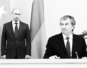 Вице-премьер Игорь Сечин (на фото – справа) держит энергетическую отрасль под контролем