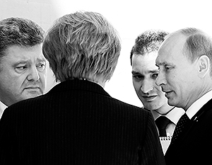Путин, Меркель и Порошенко пообщались перед завтраком в Нормандии