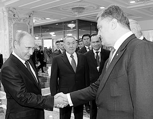 Во встрече Путина и Порошенко важны даже сам факт встречи и рукопожатия, полагают эксперты