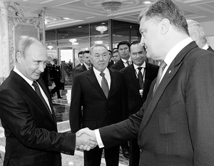 Путин договорился с Порошенко о мирном разрешении ситуации на Украине