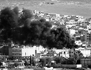 Пылающий курдский город Кобани в Сирии косвенно дал повод к ссоре двух стран НАТО