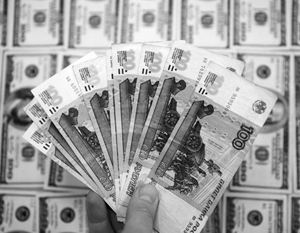 Российский рубль укрепился ниже 60 рублей за доллар, что произошло впервые с июля 2015 года