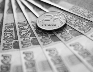 Рубль ждет в этом году медленная девальвация с 61 до 66 за доллар