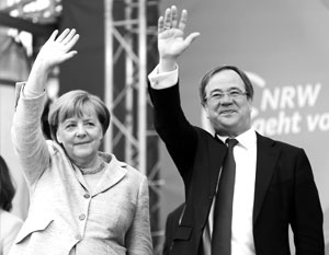 Ангела Меркель и лидер ячейки ХДС в Северном Рейне – Вестфалии Армин Лашет сегодня чувствуют себя победителями