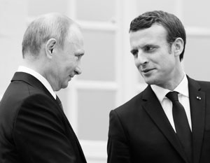 Путин впервые приехал в Версаль – а заодно и познакомился с новым президентом Франции
