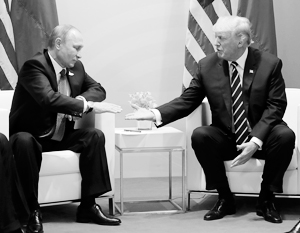 Дональд Трамп и Владимир Путин в ходе первой встречи в Гамбурге 7 июля 2017 года