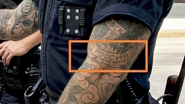 Блогеров заинтересовал американский полицейский с тату «Россия»