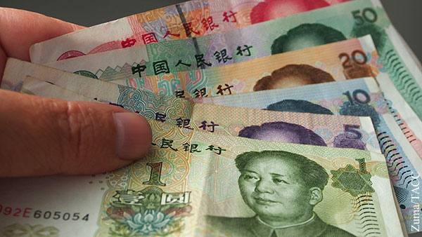 Экономика: Когда юань займет место доллара и евро в России