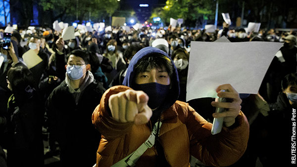 Эксперт предрек смягчение антиковидных мер в КНР на волне протестов