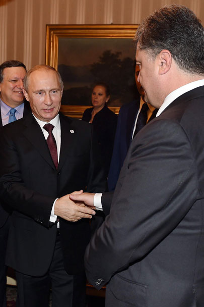 Путин назвал позитивной встречу с участием Порошенко