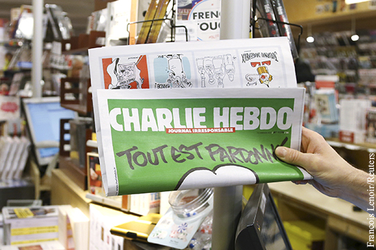 Charlie Hebdo опубликовал карикатуры с мертвым сирийским мальчиком