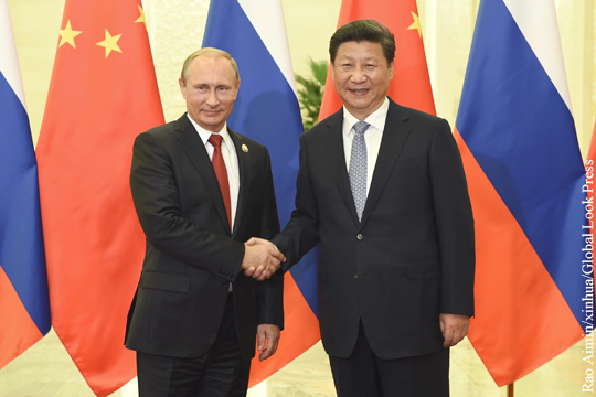 Путин сообщил о планах посетить летом Китай