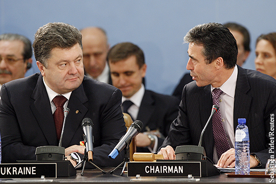 Расмуссен призвал Порошенко не забывать о выполнении минских соглашений