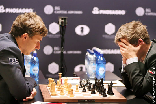 Карякин и Карлсен сыграли вничью в девятой партии матча за мировую шахматную корону