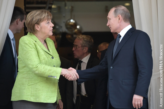 Меркель пообещала Путину поговорить с Порошенко про Донбасс
