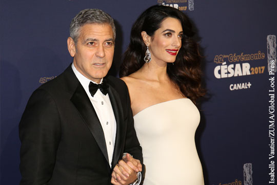 Джордж Клуни пообещал засудить журнал за публикацию фото его детей