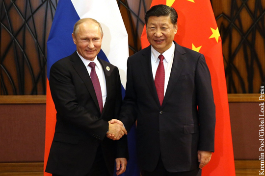 Путин поздравил Си Цзиньпина с переизбранием