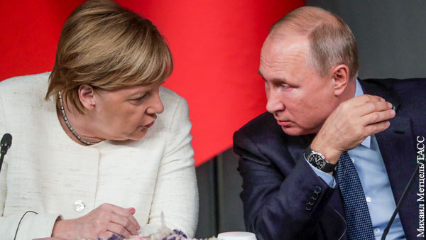 Путин обсудил смену власти на Украине с Меркель и Макроном